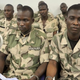 Some of 59 Nigerian soldiers facing trial, on charges of mutiny and conspiracy to commit mutiny over claims that they refused to fight Boko Haram militants, sit handcuffed on Oct. 15, 2014, in the military courtroom in Abuja, Nigeria.
AFP/Getty Images